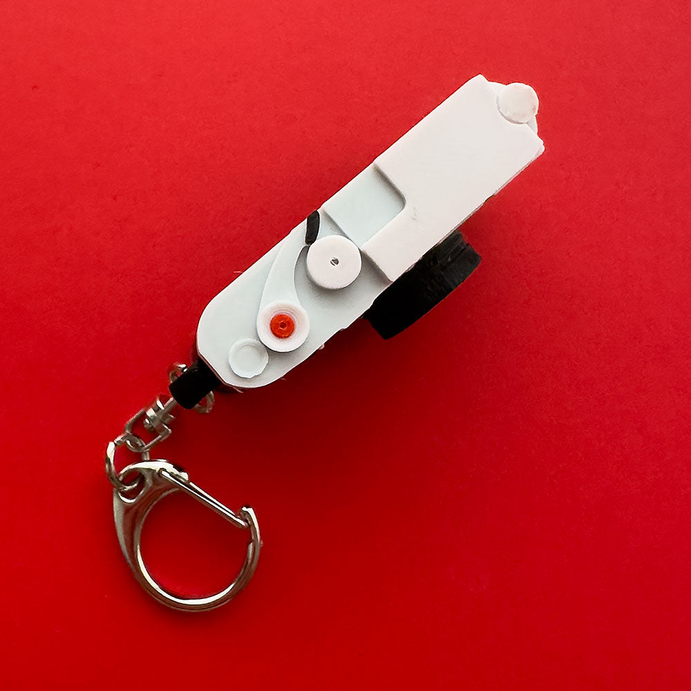 TapTags Classic Rangefinder NFC keyring shown on the top