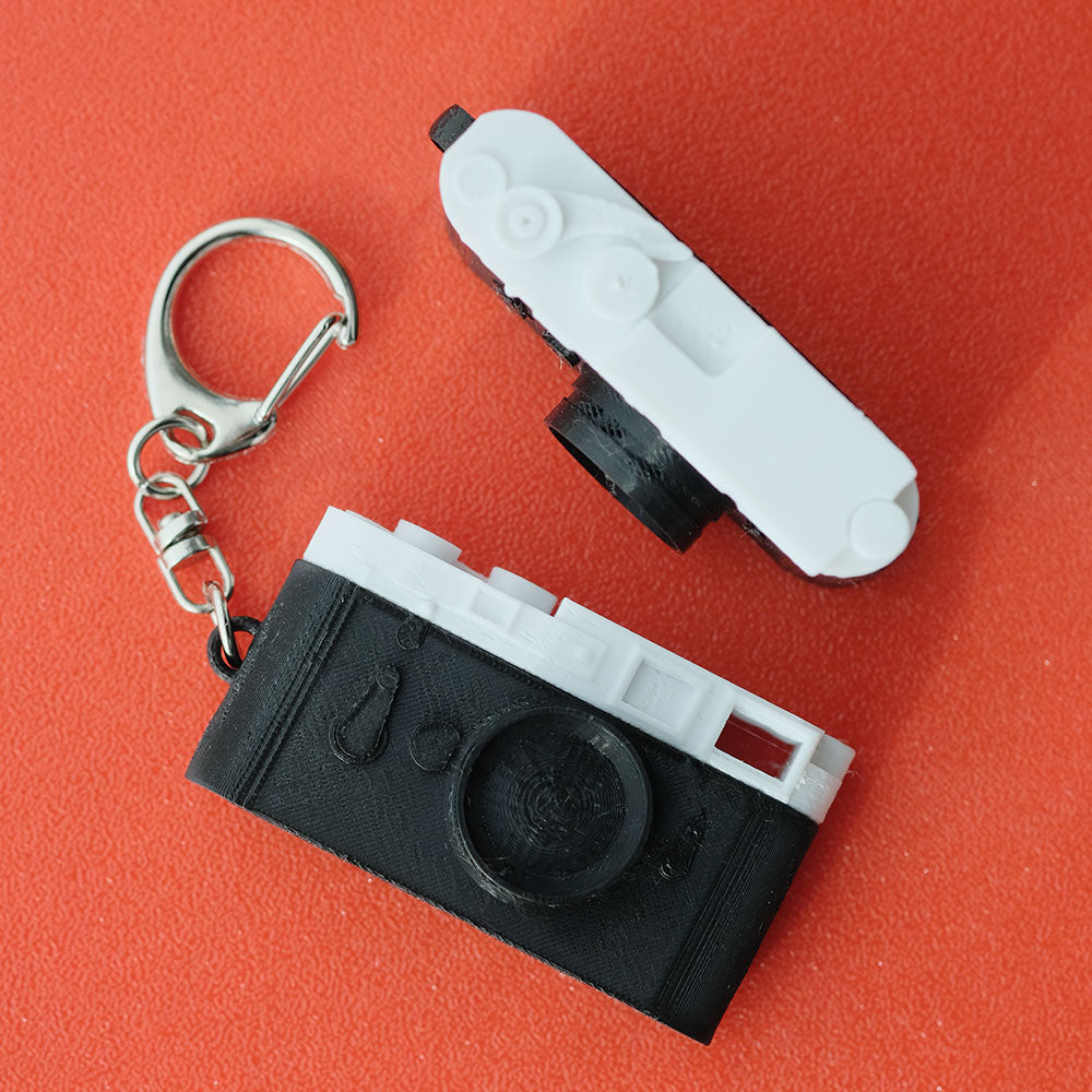 TapTags Classic Rangefinder NFC keyring shown on the top
